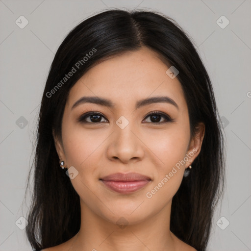 Joyful latino young-adult female with long  brown hair and brown eyes