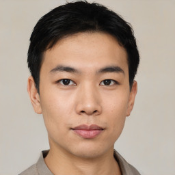 Neutral asian young-adult male with short  black hair and brown eyes