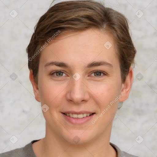 Joyful white young-adult female with short  brown hair and grey eyes