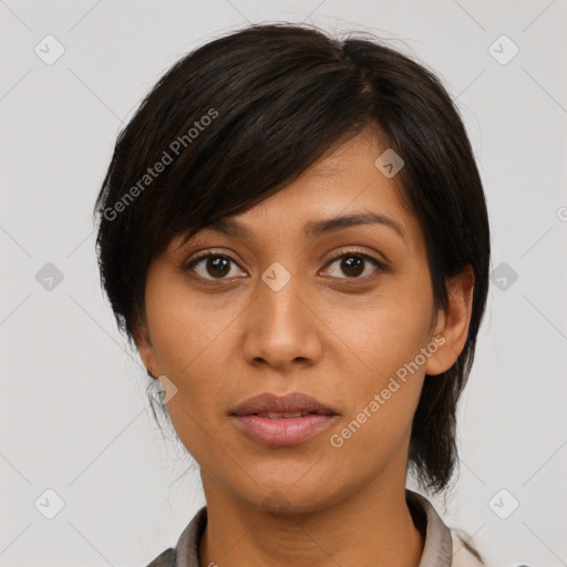 Joyful asian young-adult female with medium  brown hair and brown eyes