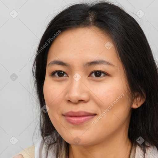 Joyful asian young-adult female with long  brown hair and brown eyes