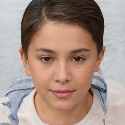 Joyful white child female with short  brown hair and brown eyes