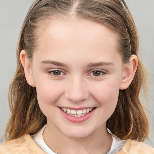 Joyful white child female with medium  brown hair and brown eyes