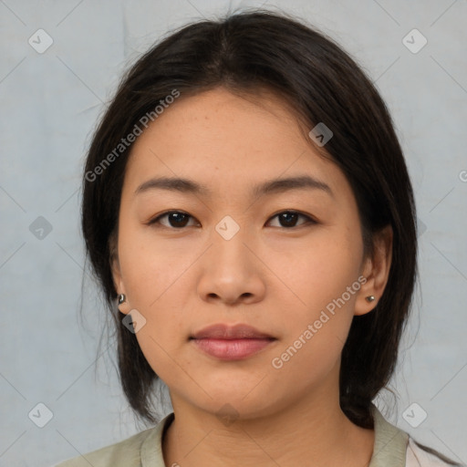 Neutral asian young-adult female with medium  brown hair and brown eyes