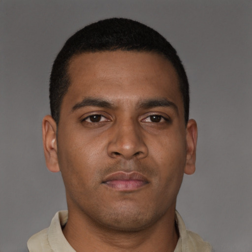 Neutral latino young-adult male with short  brown hair and brown eyes