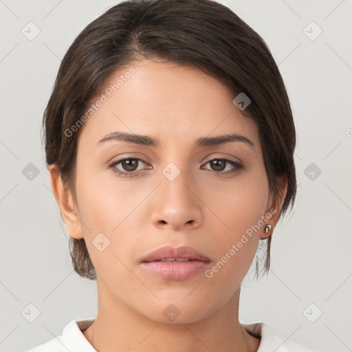 Neutral white young-adult female with medium  brown hair and brown eyes