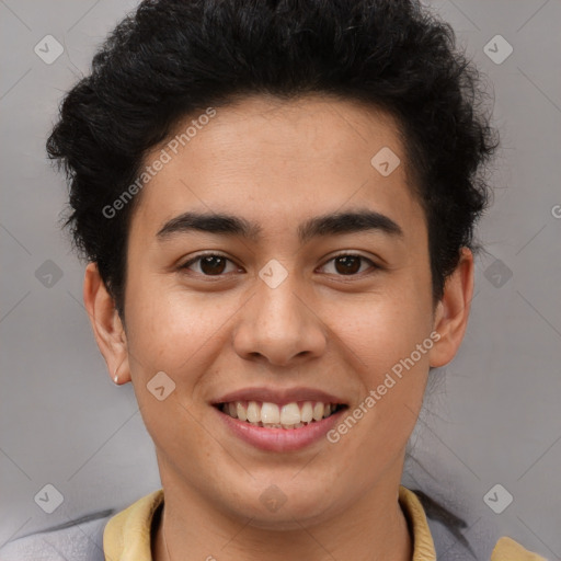 Joyful latino young-adult male with short  brown hair and brown eyes