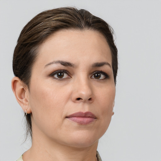 Neutral white young-adult female with medium  brown hair and brown eyes