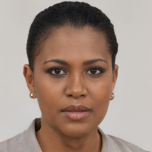Neutral black young-adult female with short  brown hair and brown eyes