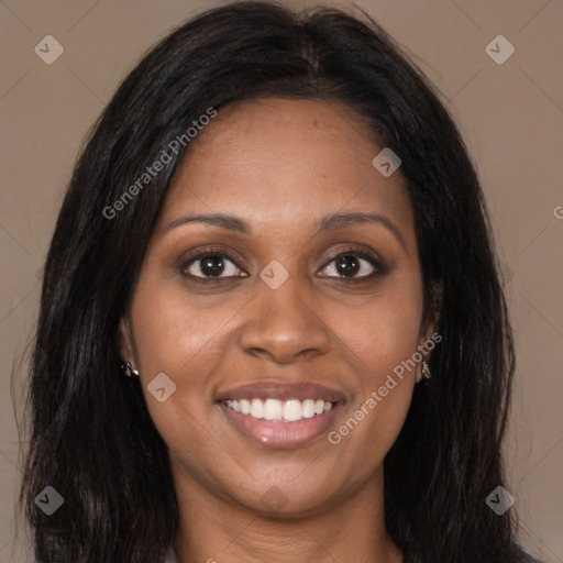 Joyful latino young-adult female with long  brown hair and brown eyes
