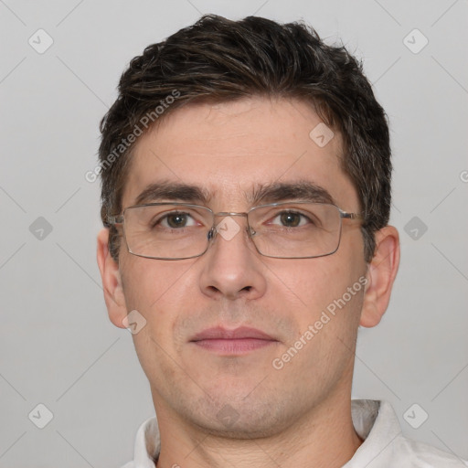 Neutral white adult male with short  brown hair and brown eyes