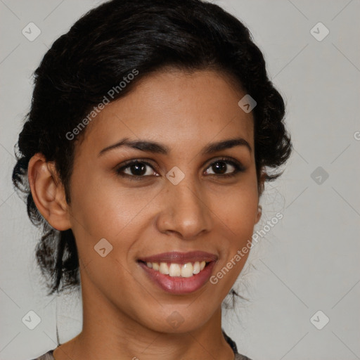 Joyful latino young-adult female with medium  brown hair and brown eyes