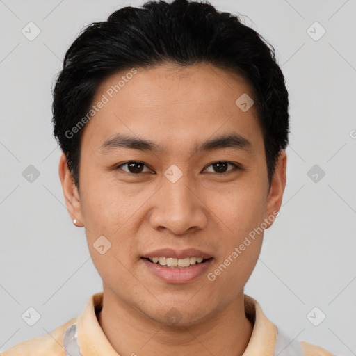 Joyful asian young-adult male with short  black hair and brown eyes