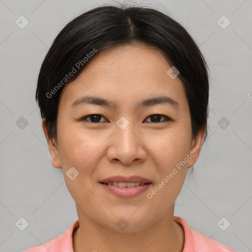 Joyful asian young-adult female with short  brown hair and brown eyes