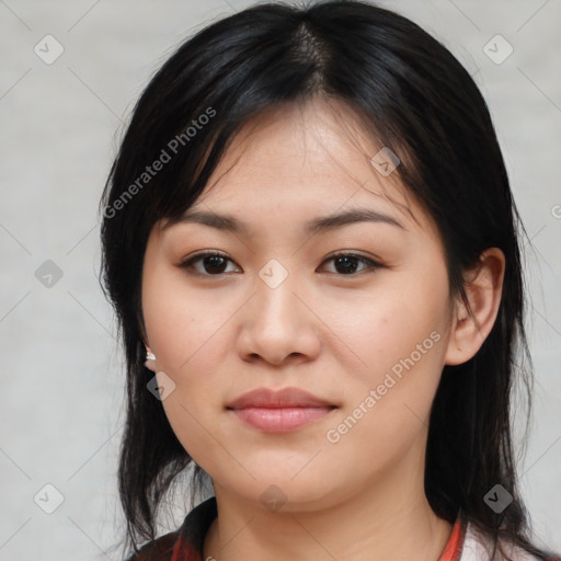 Joyful asian young-adult female with medium  black hair and brown eyes