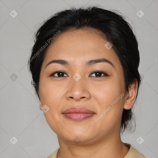 Joyful asian young-adult female with medium  brown hair and brown eyes