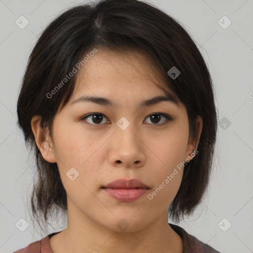 Neutral asian young-adult female with medium  brown hair and brown eyes