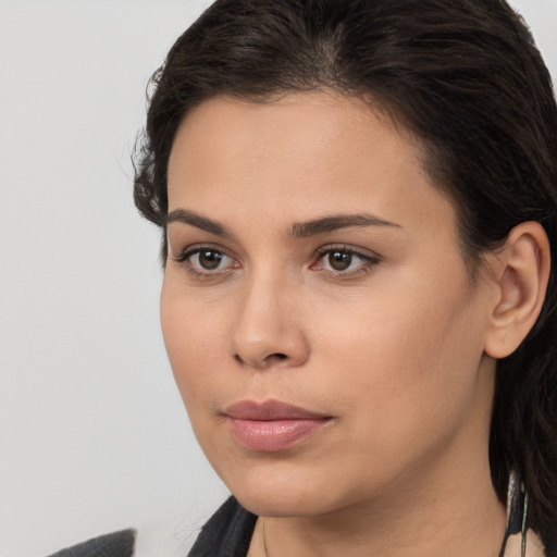 Neutral white young-adult female with medium  brown hair and brown eyes