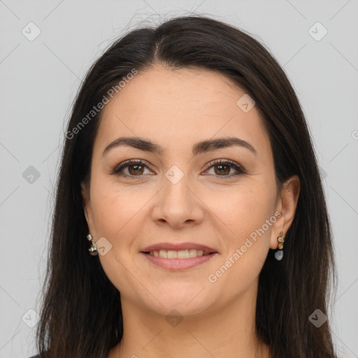 Joyful white young-adult female with long  brown hair and brown eyes