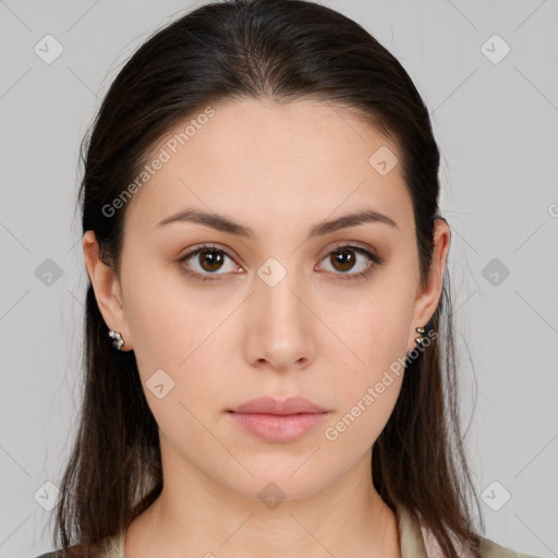 Neutral white young-adult female with long  brown hair and brown eyes