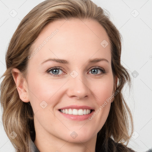 Joyful white young-adult female with long  brown hair and blue eyes