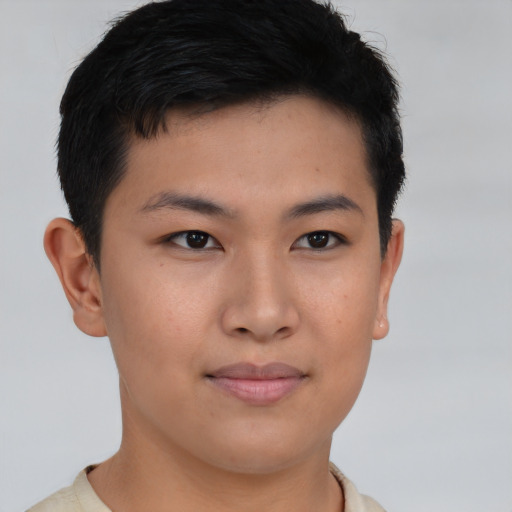 Joyful asian young-adult male with short  brown hair and brown eyes