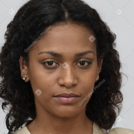 Neutral black young-adult female with medium  brown hair and brown eyes