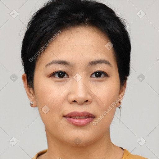 Joyful asian young-adult female with short  brown hair and brown eyes