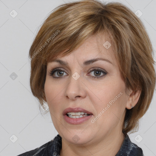 Joyful white adult female with medium  brown hair and grey eyes