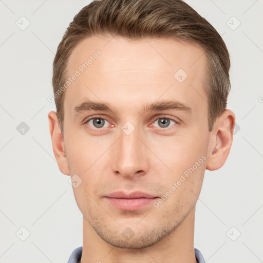 Neutral white young-adult male with short  brown hair and grey eyes