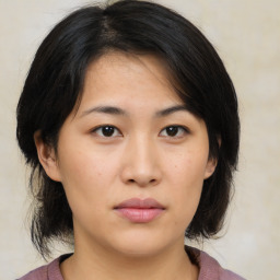 Neutral asian young-adult female with medium  brown hair and brown eyes