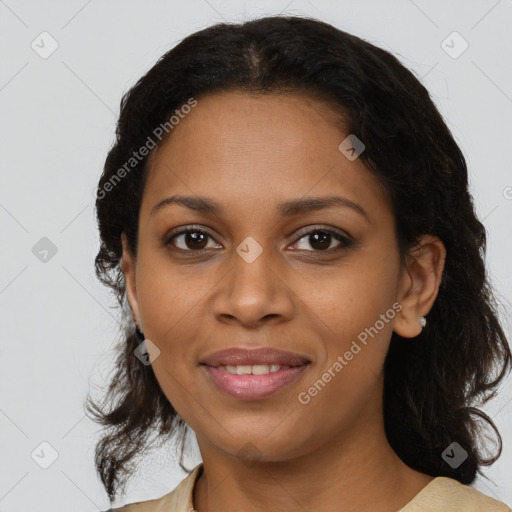 Joyful black young-adult female with medium  brown hair and brown eyes