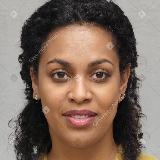 Joyful black young-adult female with long  brown hair and brown eyes