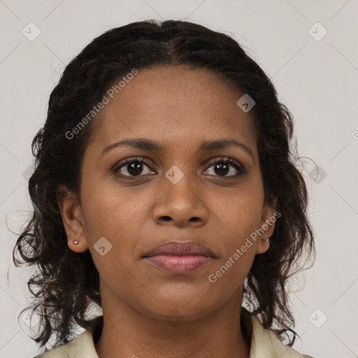 Joyful black young-adult female with medium  brown hair and brown eyes