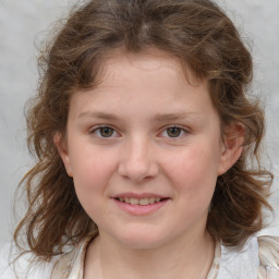 Joyful white child female with medium  brown hair and grey eyes