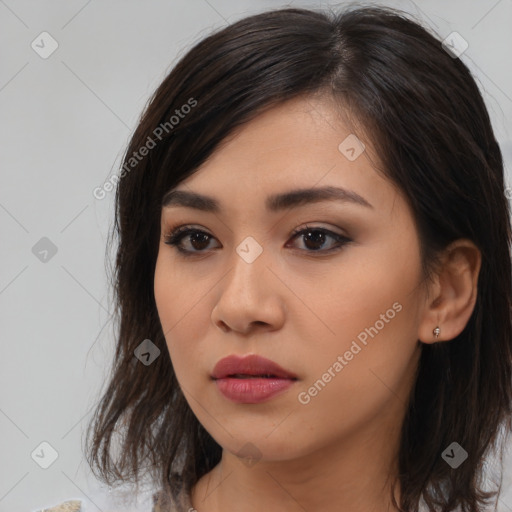 Neutral asian young-adult female with medium  brown hair and brown eyes