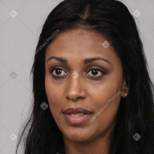 Joyful latino young-adult female with long  black hair and brown eyes