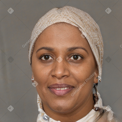 Joyful black adult female with short  black hair and brown eyes