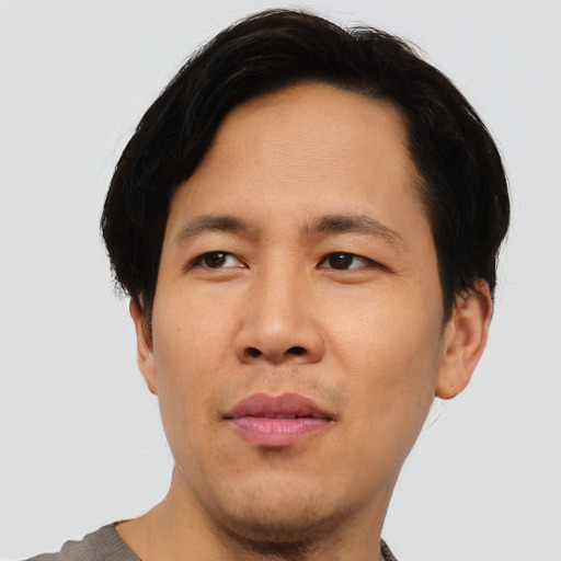 Neutral asian young-adult male with short  black hair and brown eyes