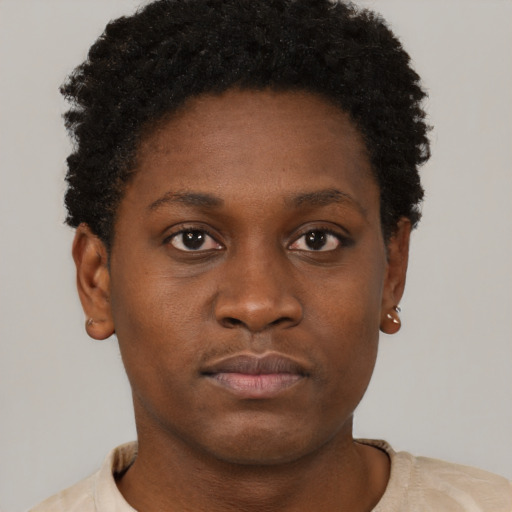 Neutral black young-adult female with short  brown hair and brown eyes