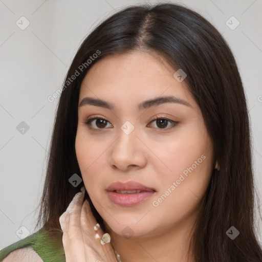 Neutral white young-adult female with long  brown hair and brown eyes