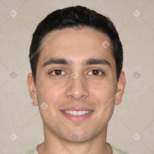 Joyful white young-adult male with short  black hair and brown eyes