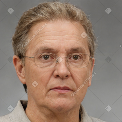 Neutral white middle-aged male with short  gray hair and brown eyes