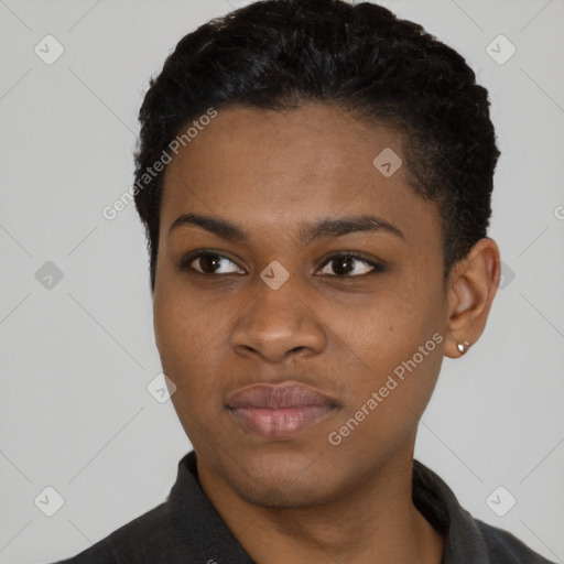 Joyful black young-adult female with short  black hair and brown eyes