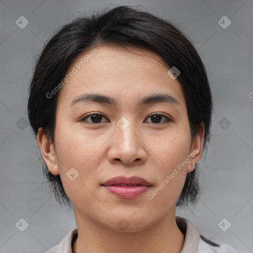 Joyful asian young-adult female with medium  brown hair and brown eyes