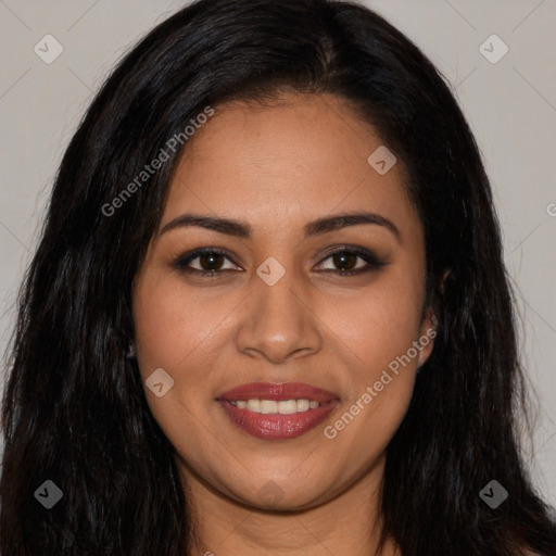 Joyful latino young-adult female with long  brown hair and brown eyes