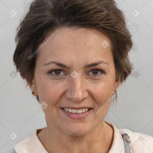 Joyful white adult female with short  brown hair and brown eyes