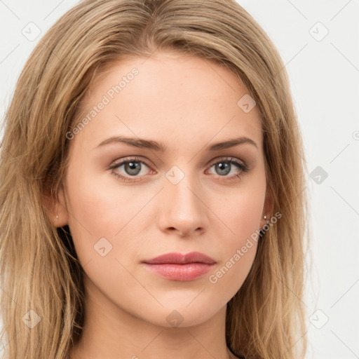 Joyful white young-adult female with long  brown hair and green eyes