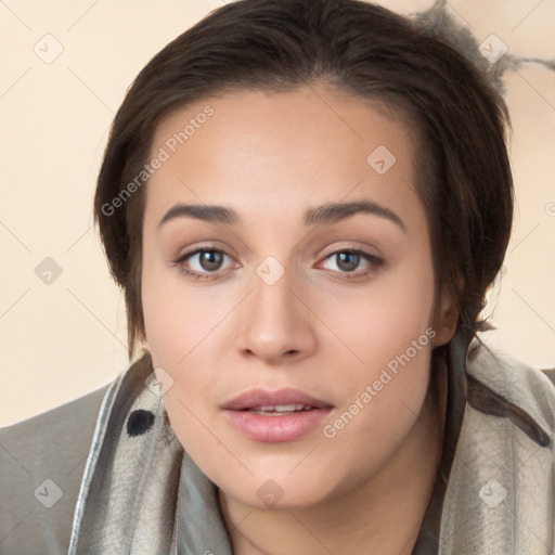 Neutral white young-adult female with long  brown hair and brown eyes