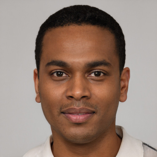 Neutral black young-adult male with short  black hair and brown eyes